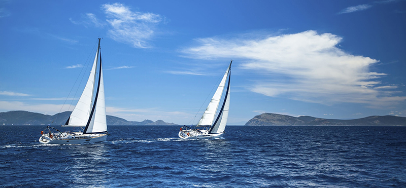 39326686 - sailing in the wind through the waves at the aegean sea in greece.