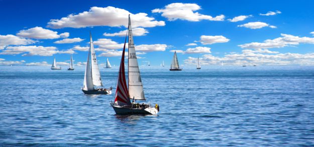 boats-clouds-ocean-144249 sailboat